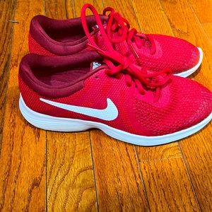 Red Nike sneakers. Size 5Y